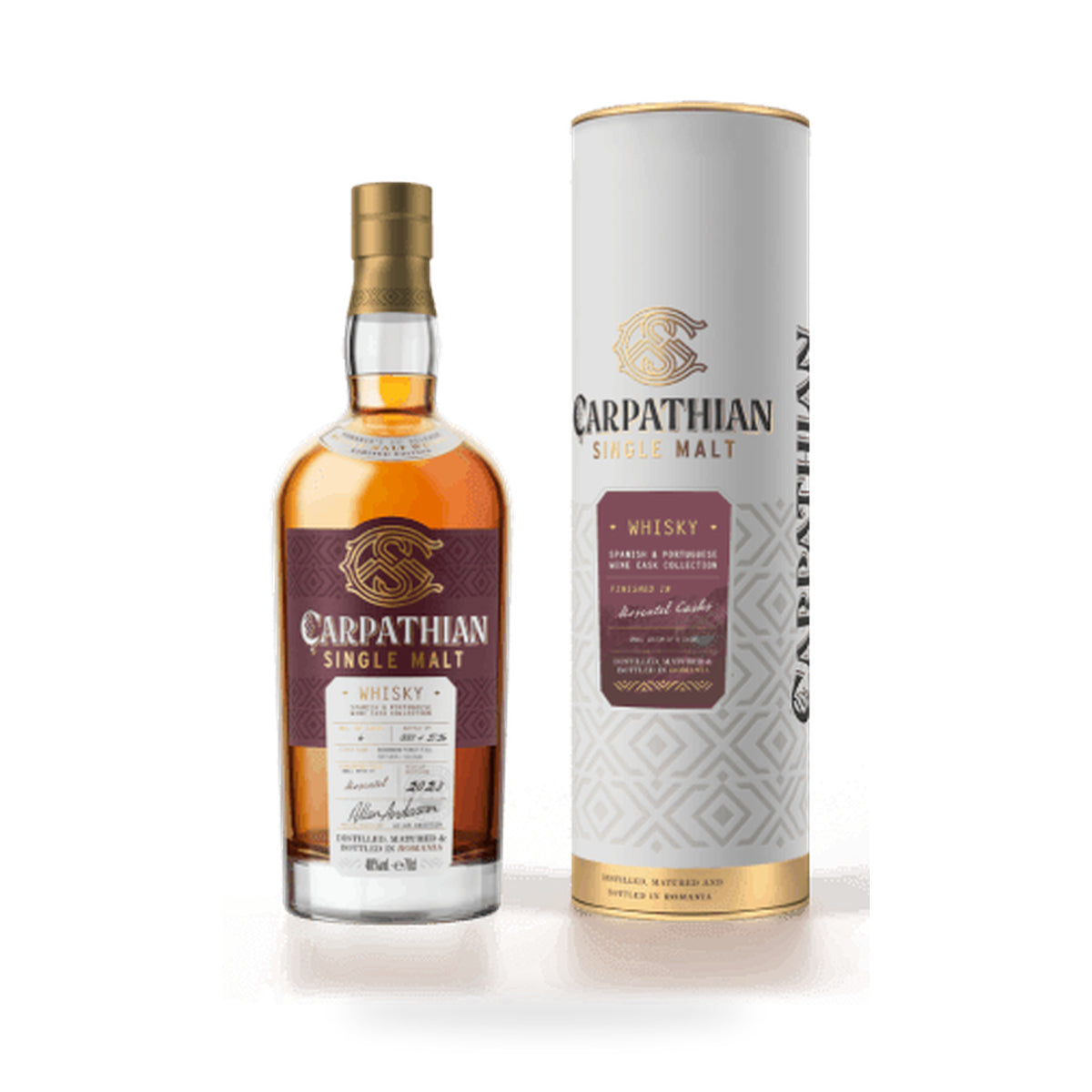 Carpathian Single Malt Whisky – Moscatel Cask Finish – amber bottle beside presentation tube